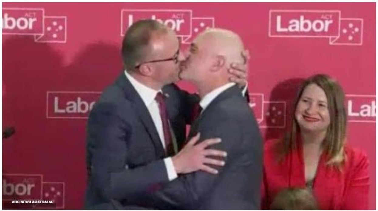 Chief Minister Andrew Barr celebrates 6th consecutive victory and four more years of Labour government by kissing his husband on stage.
