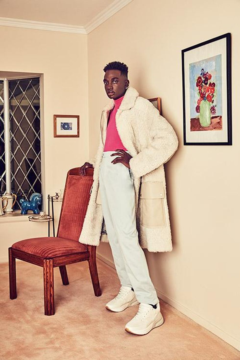 Coat, turtleneck, and pants by Hermès. Shoes by Alexander McQueen.