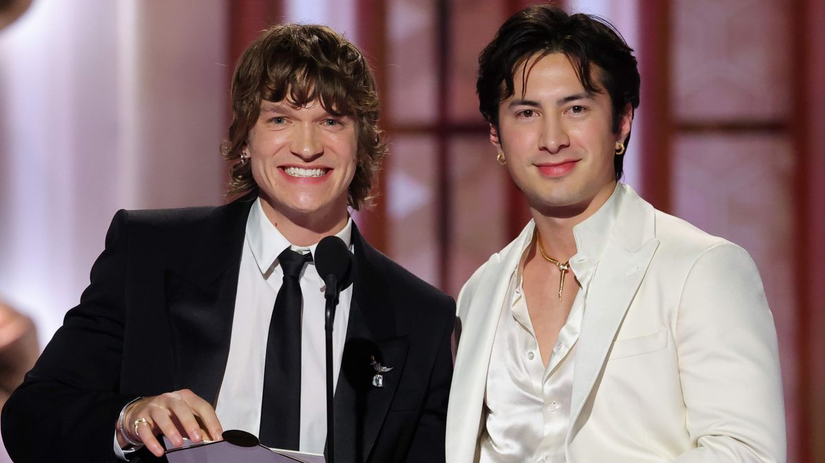 Connor Storrie and Hudson Williams presenting at the Golden Globes