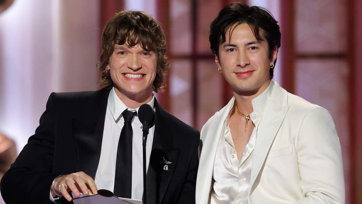 Connor Storrie and Hudson Williams presenting at the Golden Globes