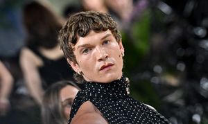 Connor Storrie rocks brunette curls in viral fashion campaign