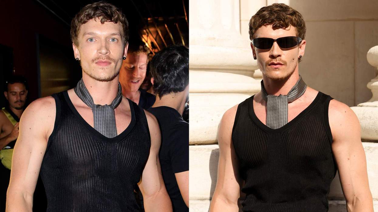 Connor Storrie wearing a black tank top and tie at Paris Fashion Week.