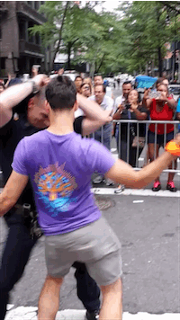 cop dance nyc gay pride gif