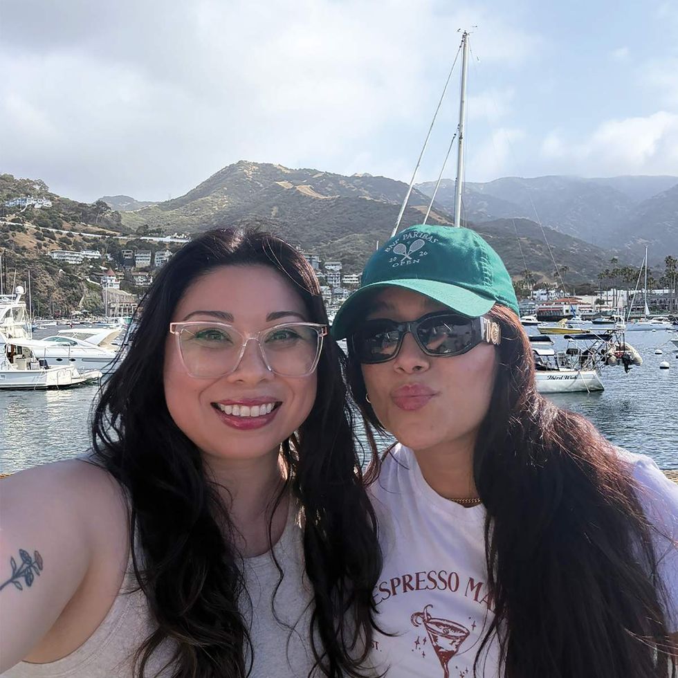 Couple taking a selfie in front of Avalon Bay