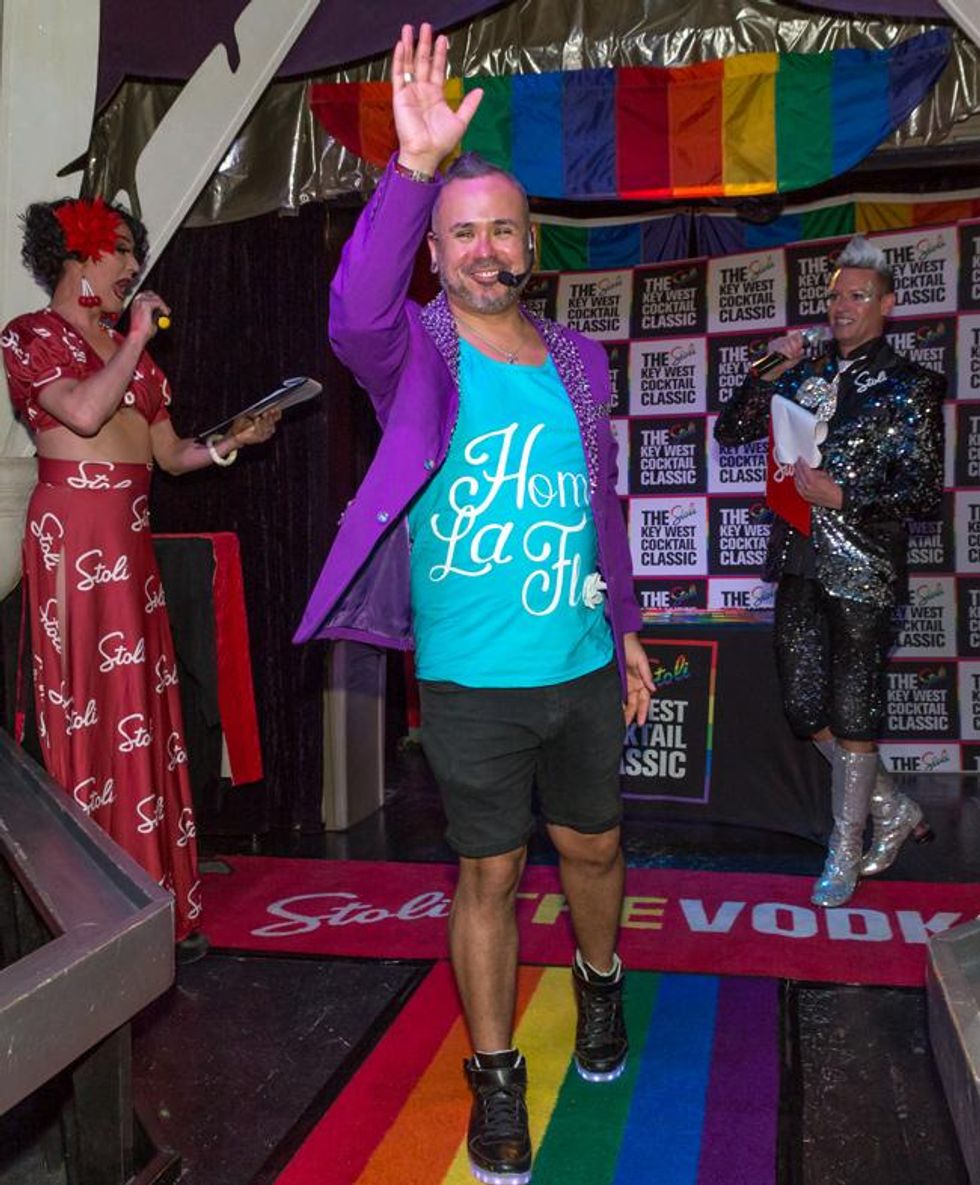 Dallas Bar Star Greg Castillo, from Round Up Saloon, waves to the crowd.