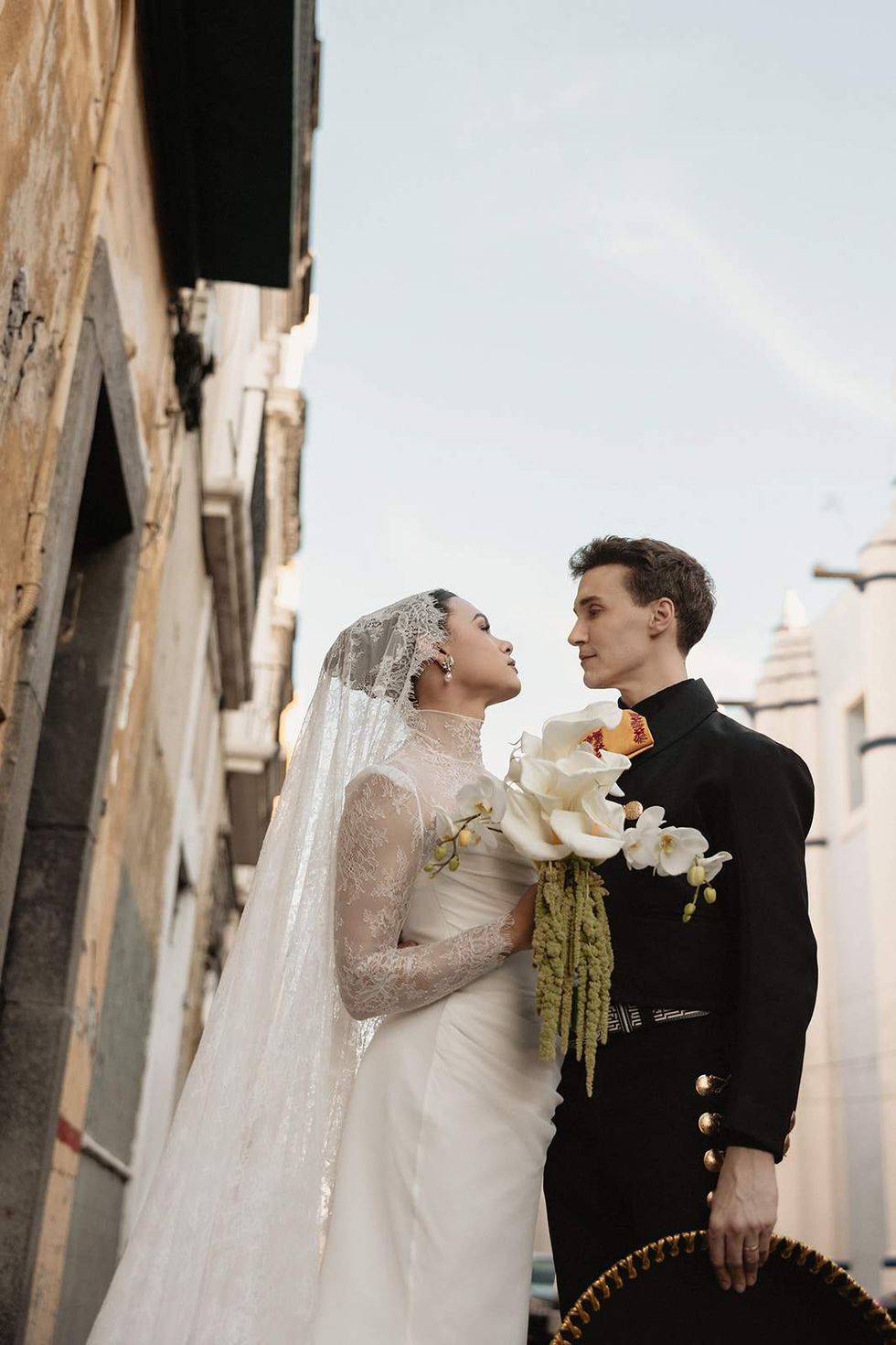 Damian Terriquez (left) and Luke Lowrey in their wedding outfits