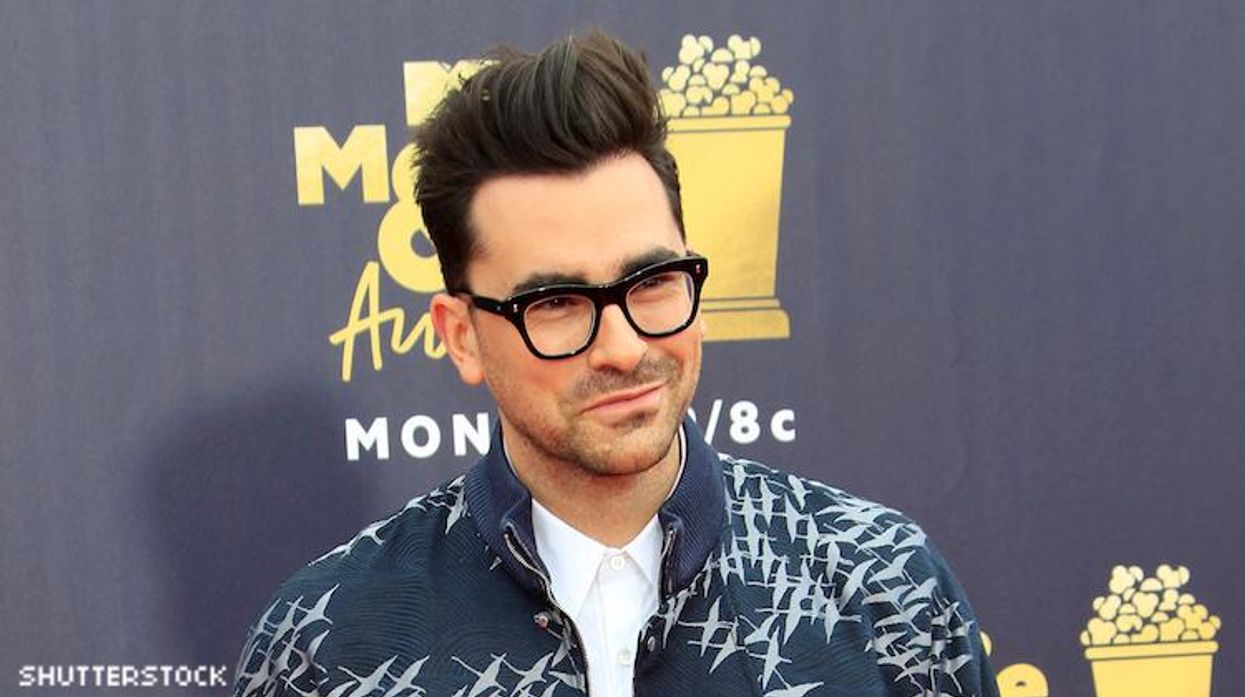 Dan Levy on a red carpet.