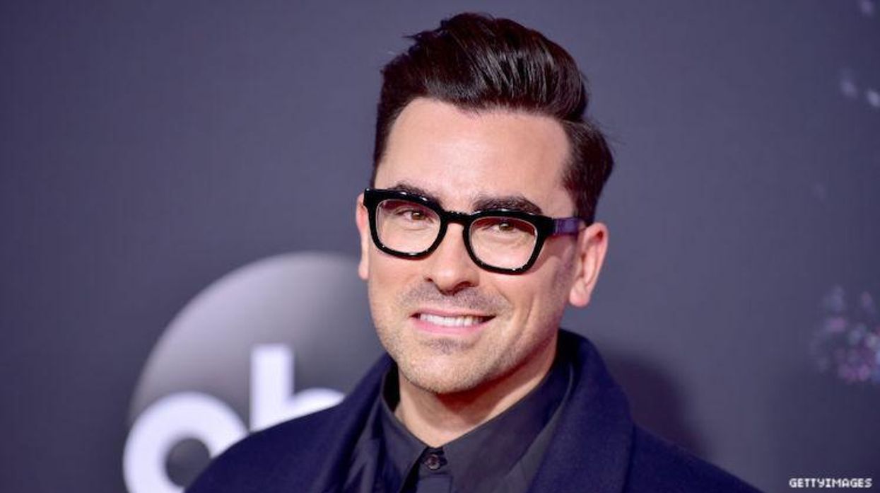 Dan Levy on a red carpet.