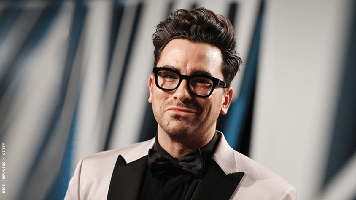 Dan Levy on a red carpet.