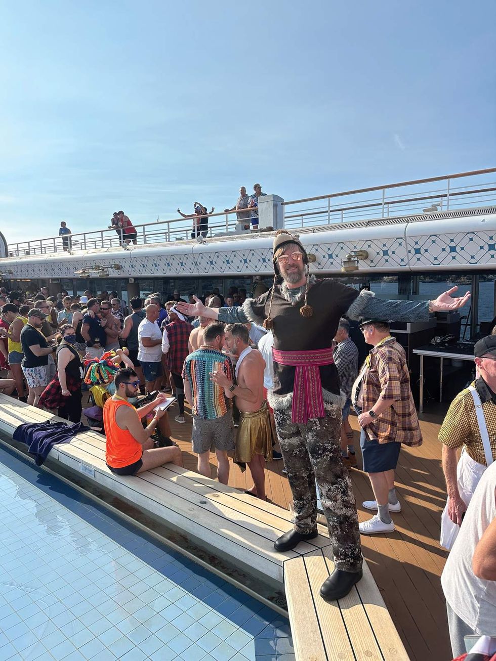 Daniel Reynolds on the deck of a VACAYA cruise ship
