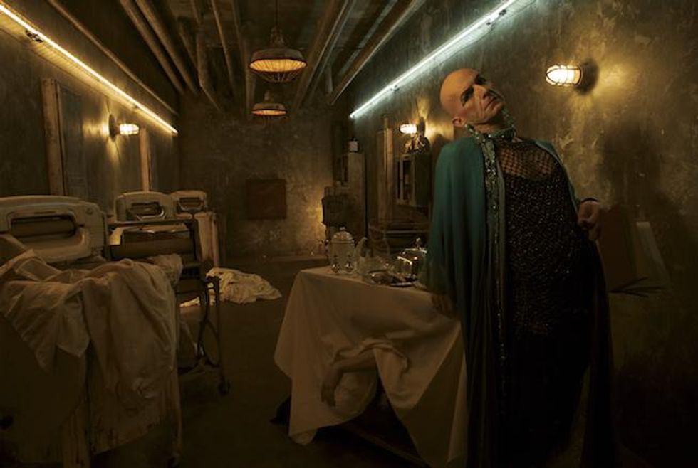 Denis O'Hare as Liz Taylor