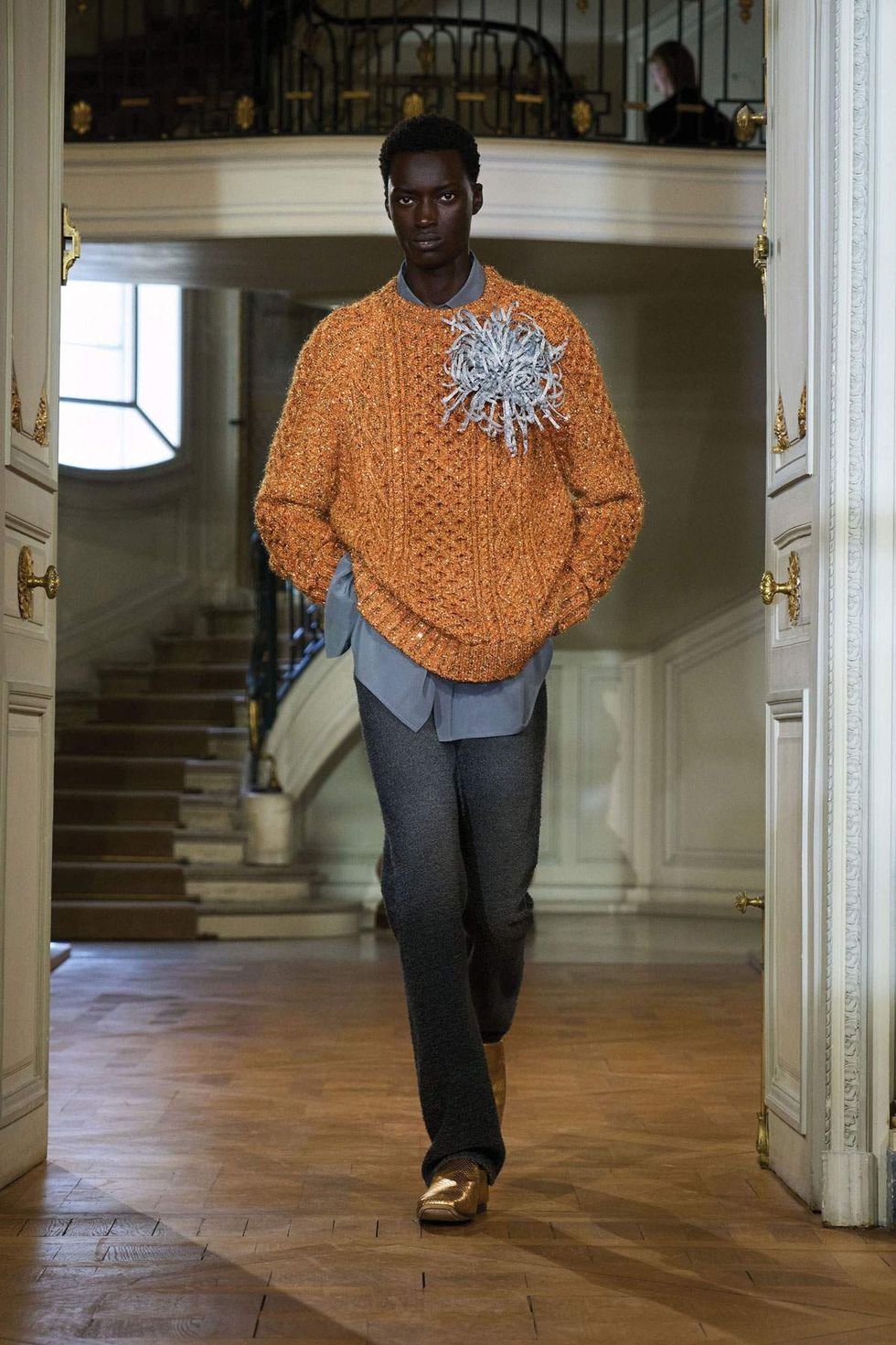 Dior runway look with large silver brooch
