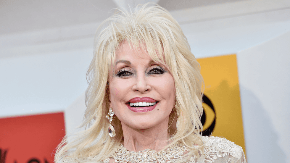 Dolly Parton smiling for the cameras