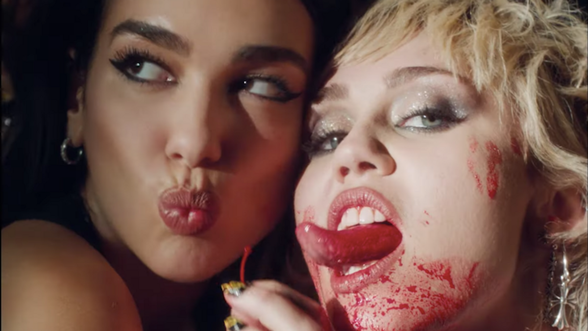 Dua Lipa licking Miley Cyrus' face in the "Prisoner" music video