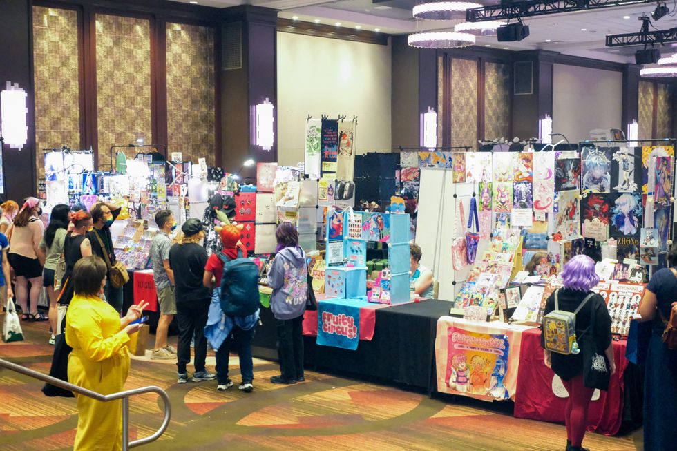 Exhibitor tables at Flame Con