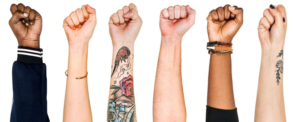 Fists from six different people