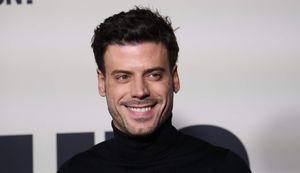 François Arnaud gets soaked in a tight white shirt in steamy new photos