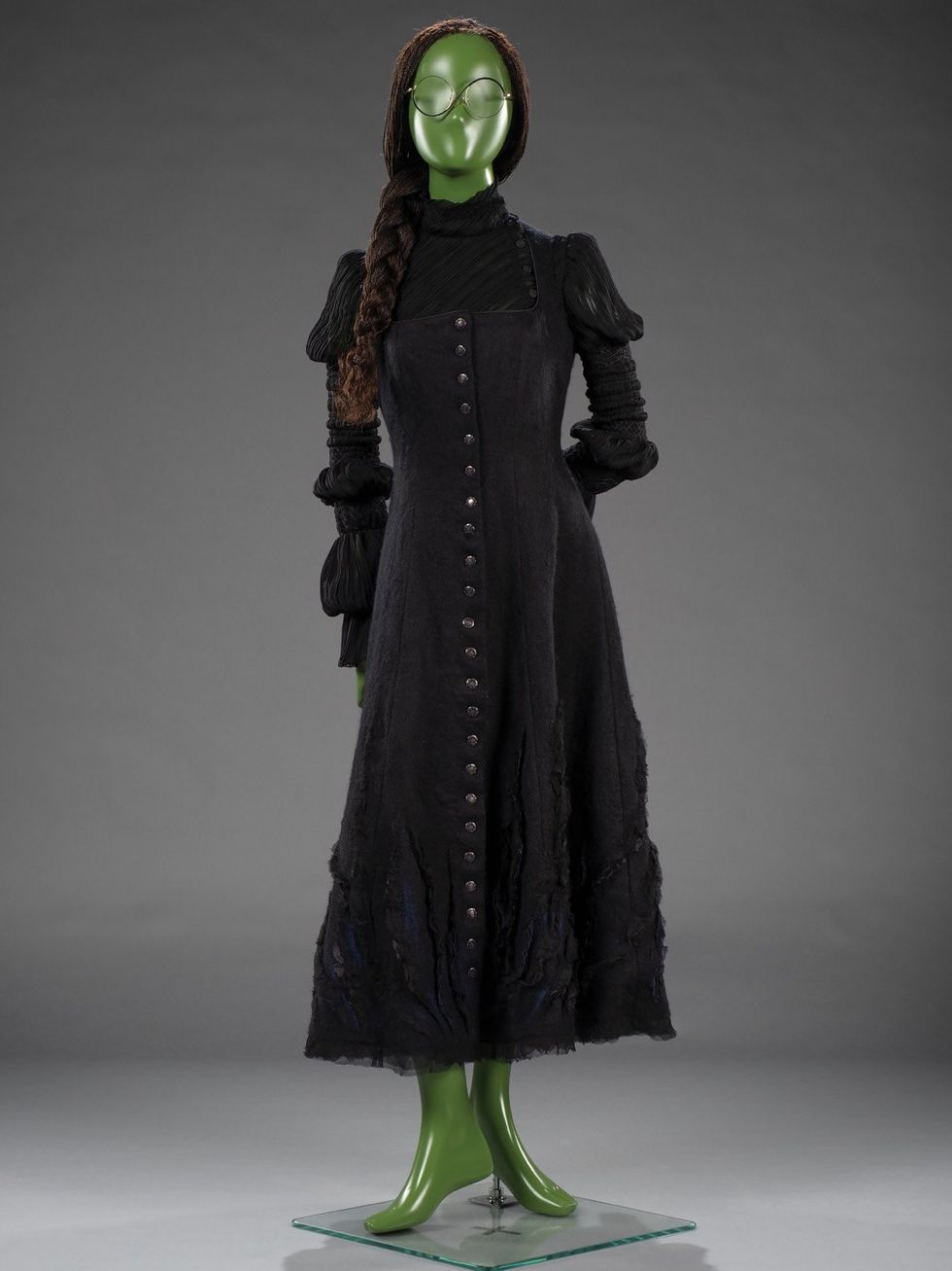 From design to execution, Elphaba\u2019s black dress references both The Wizard of Oz as well as the Wicked character\u2019s age.