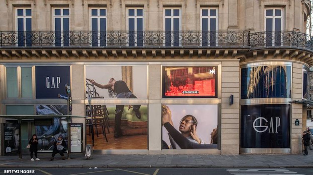 Gap storefront in Paris with Telfar Clemens in windows.