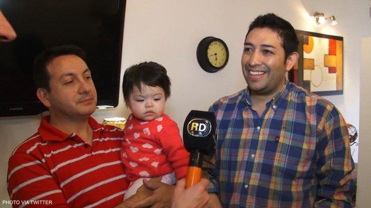 gay couple adopting baby living with HIV