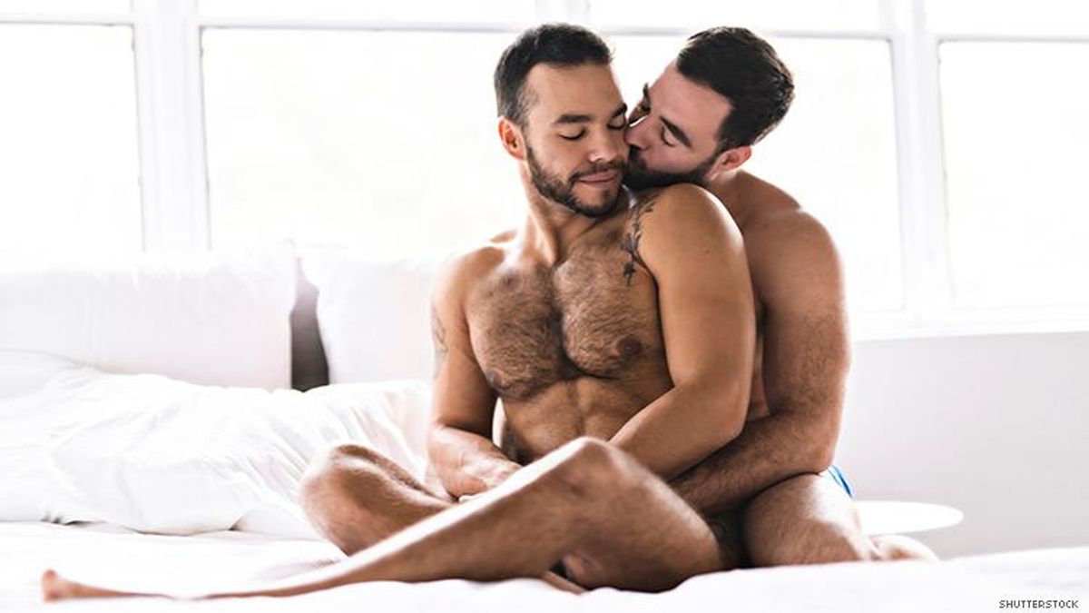 GAY COUPLE IN BED