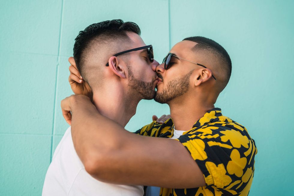 Gay couple kissing