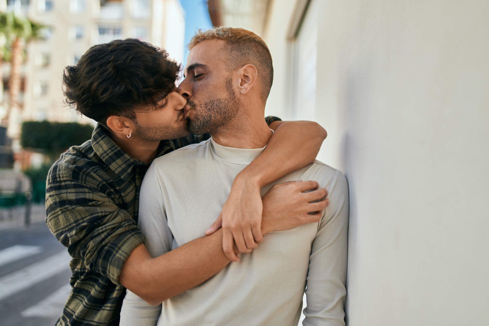 Gay couple kissing