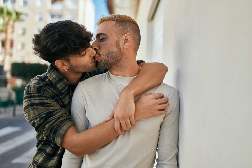 Gay couple kissing