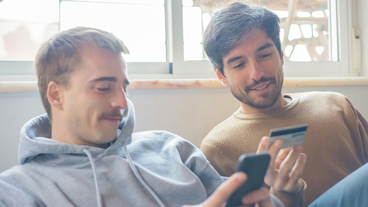 Gay couple reviews finances as they budget for their wedding