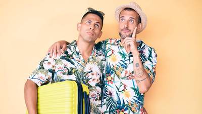 gay couple with suitcase
