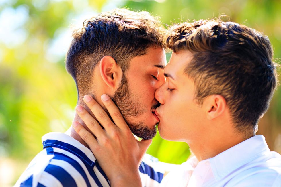 Gay men kissing