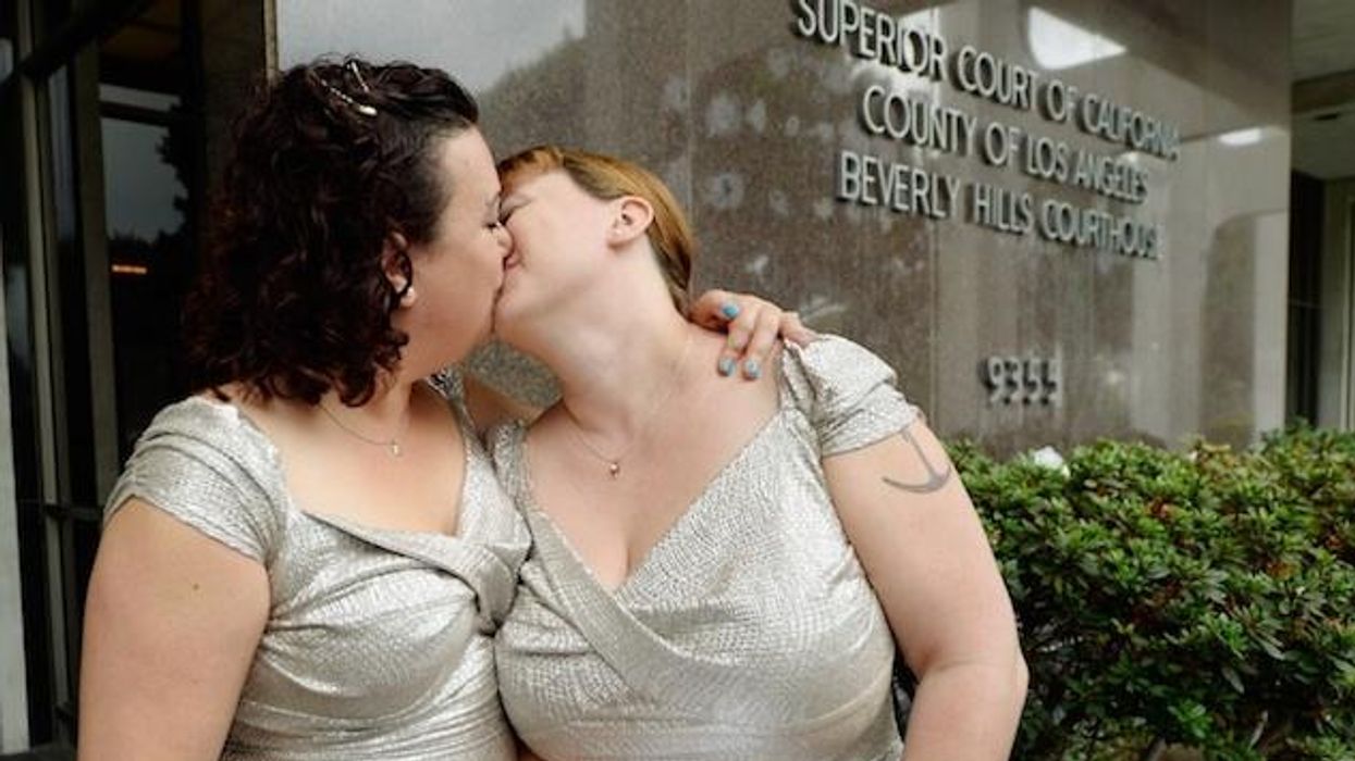 Getty-shana-wedding-kiss-cr