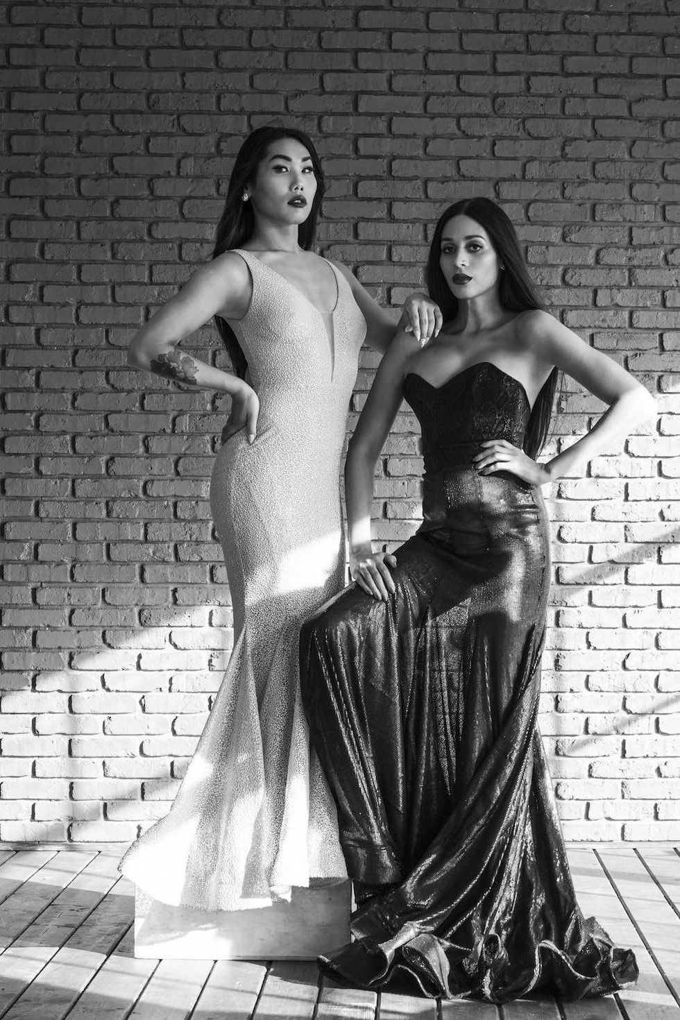 Gia Gunn in Nicole Bakti sequin gown. Isis King in Berenice Gonzalez black gown.