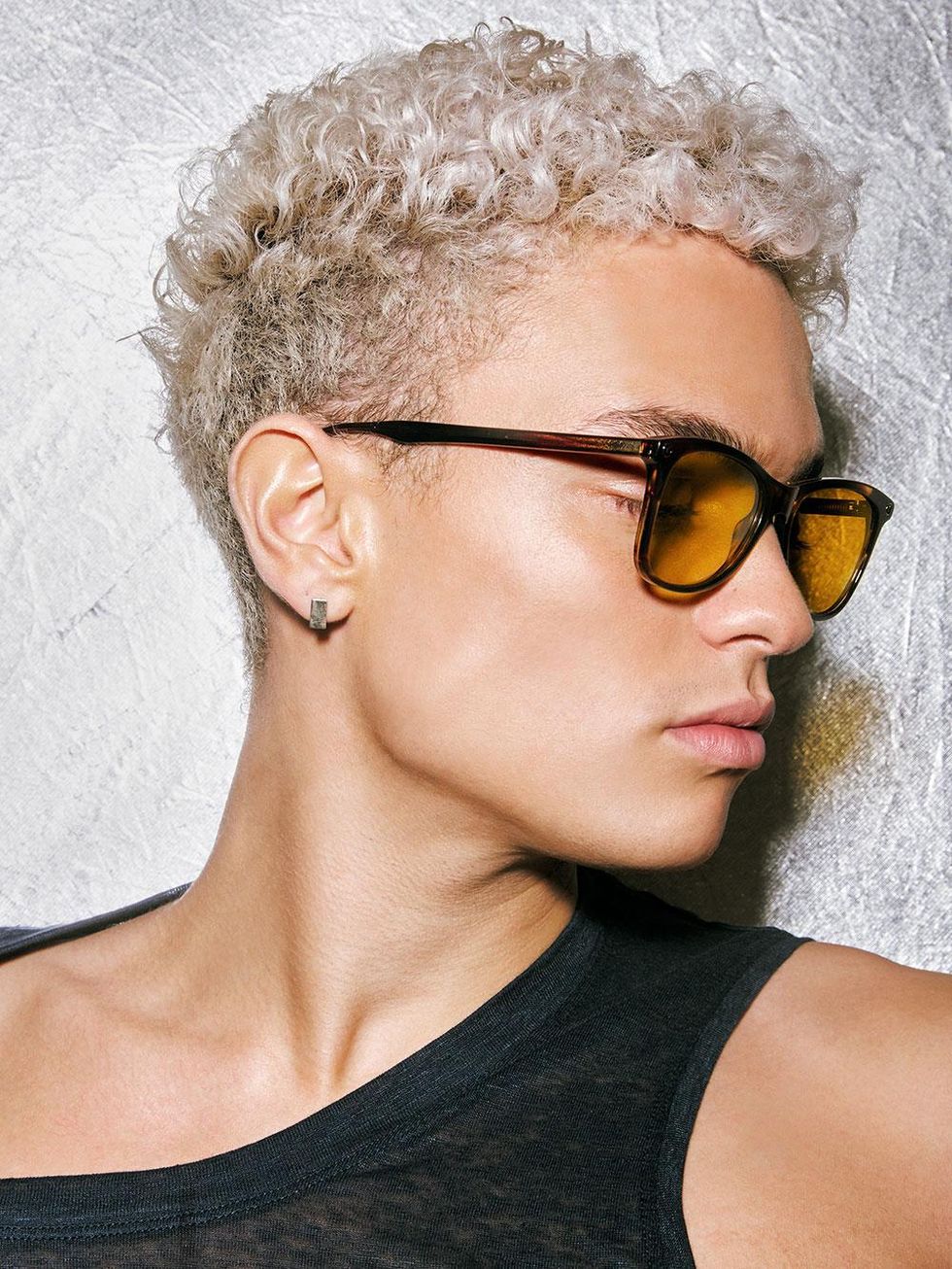 Glasses by Polaroid $65, tank top by Michael Kors $98