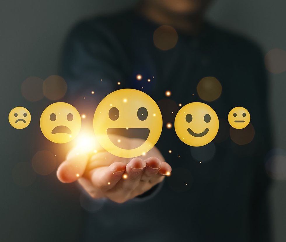 graphic illustration extended hand showing various emojis