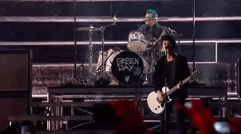 Green Day performing at a concert