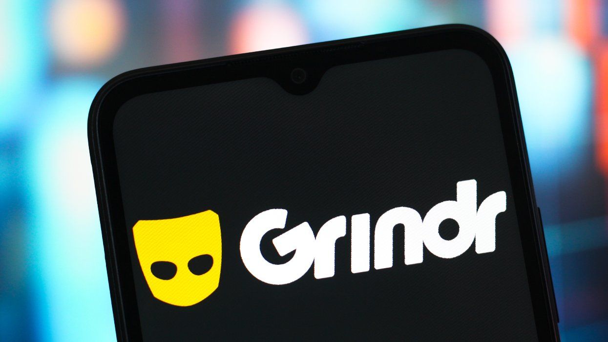 Grindr logo displayed on a phone