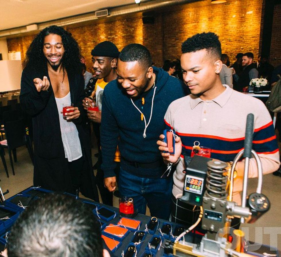 Guests picking out their custom emossed leather goods at The Road Ahead Summit