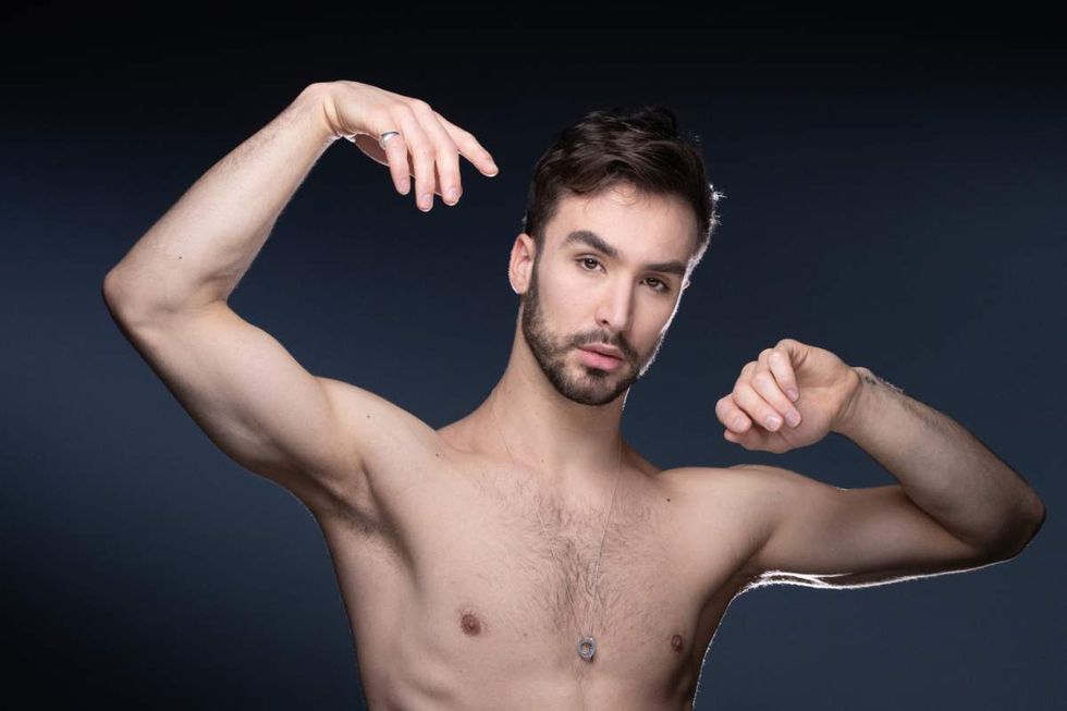 Guillaume Cizeron poses during a photo session in Paris on February 23, 2022.
