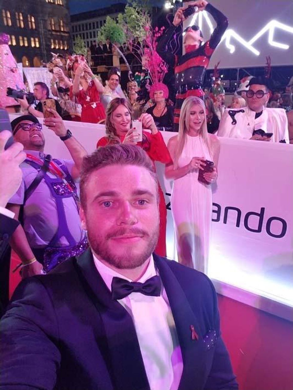 Gus in the middle of the red carpet action.