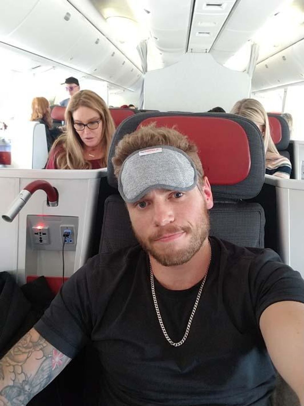 Gus on the plane home with Caitlyn Jenner.