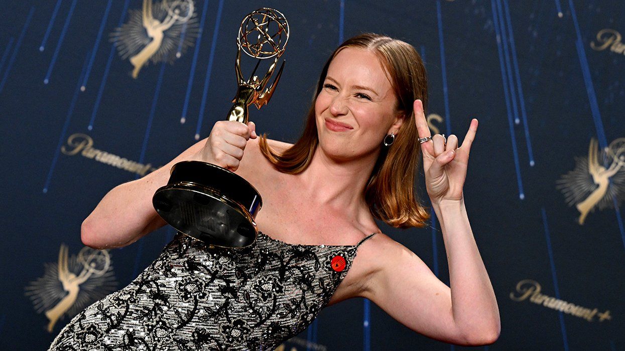 Hannah Einbinder poses with a statue at the 77th Emmy Awards