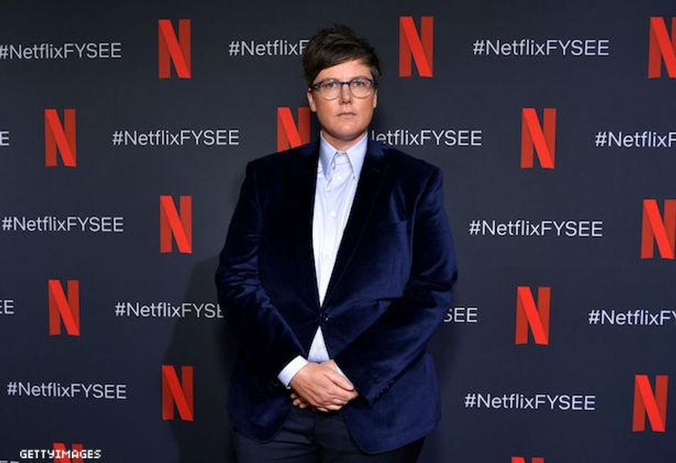 Hannah Gadsby on a red carpet.