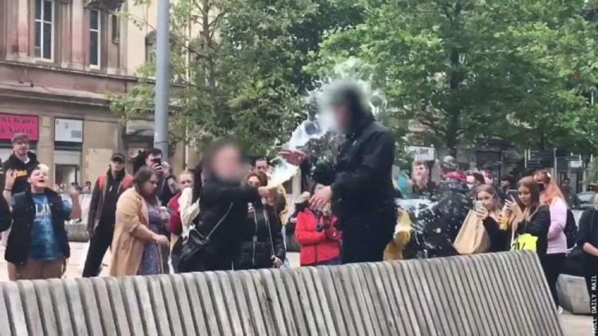 Hateful Street Preacher Gets Doused With Milk in Viral Video
