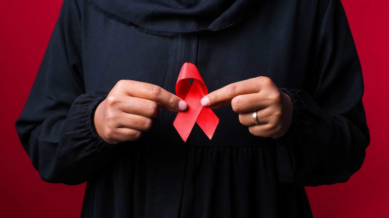 HIV ribbon Black hands