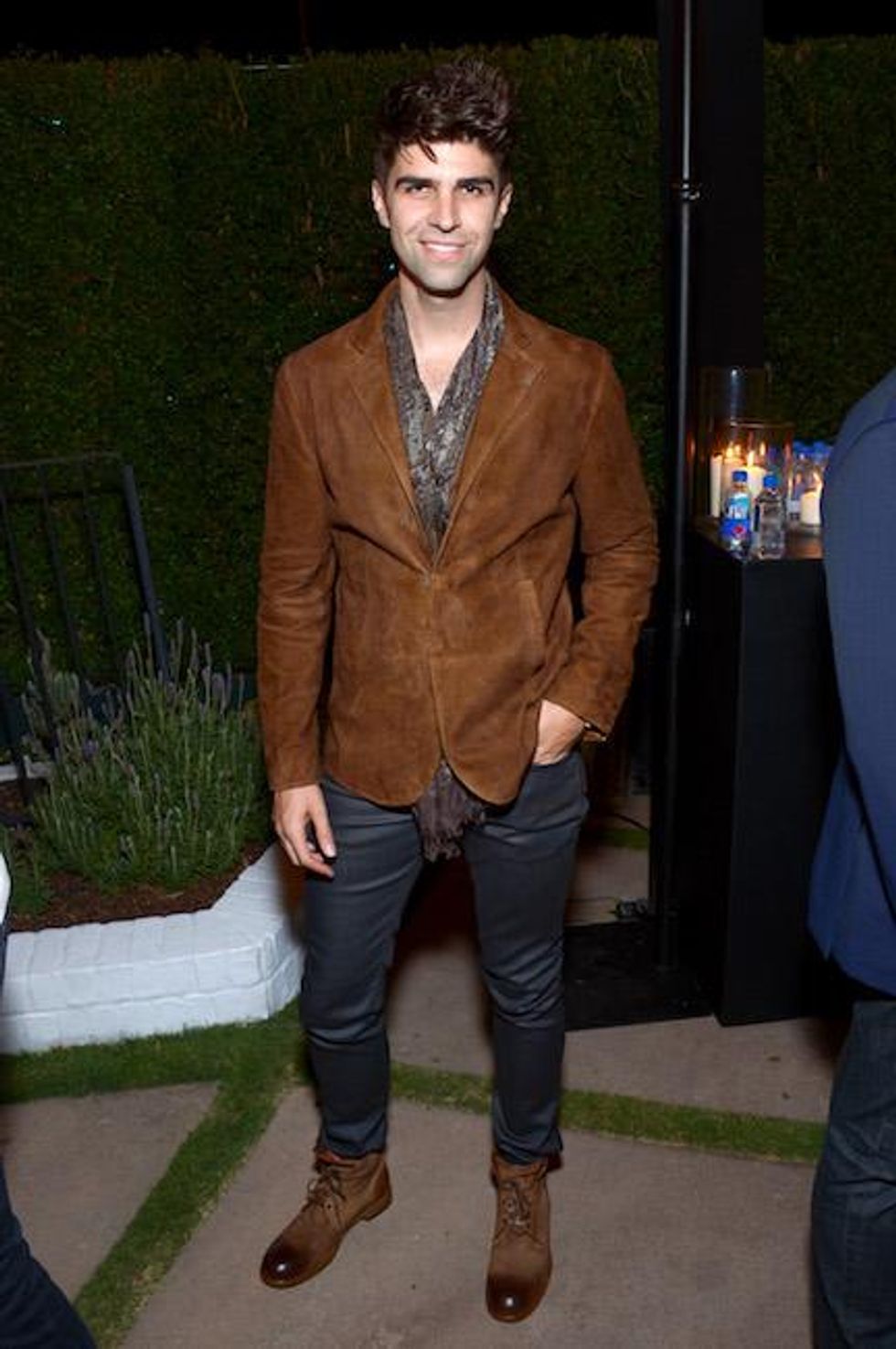 Host Justin Mikita styled in John Varvatos