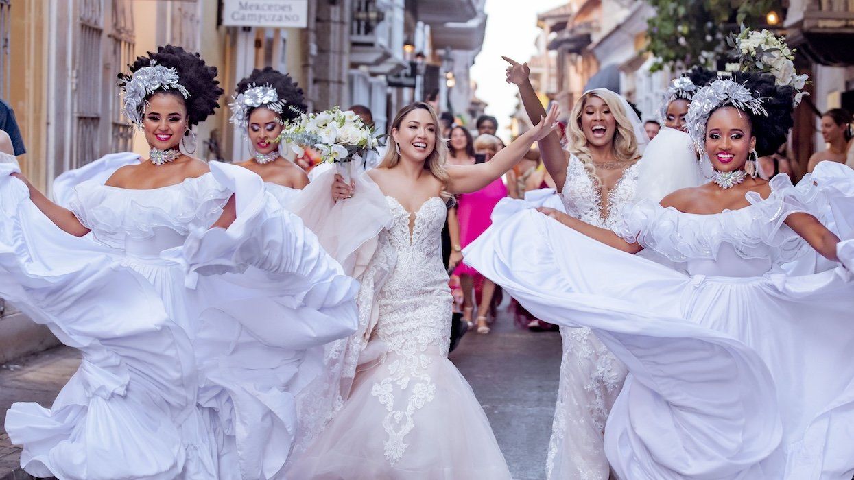 This luxe Cartagena wedding featured a drag queen, dancer-led parades, and a traditional 'Crazy Hour'