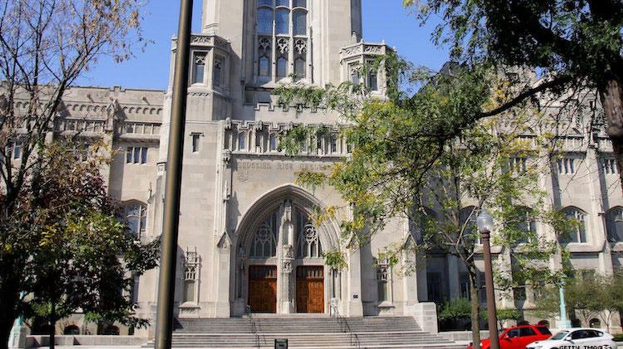 Indianapolis Catholic school fires openly gay, married teacher.