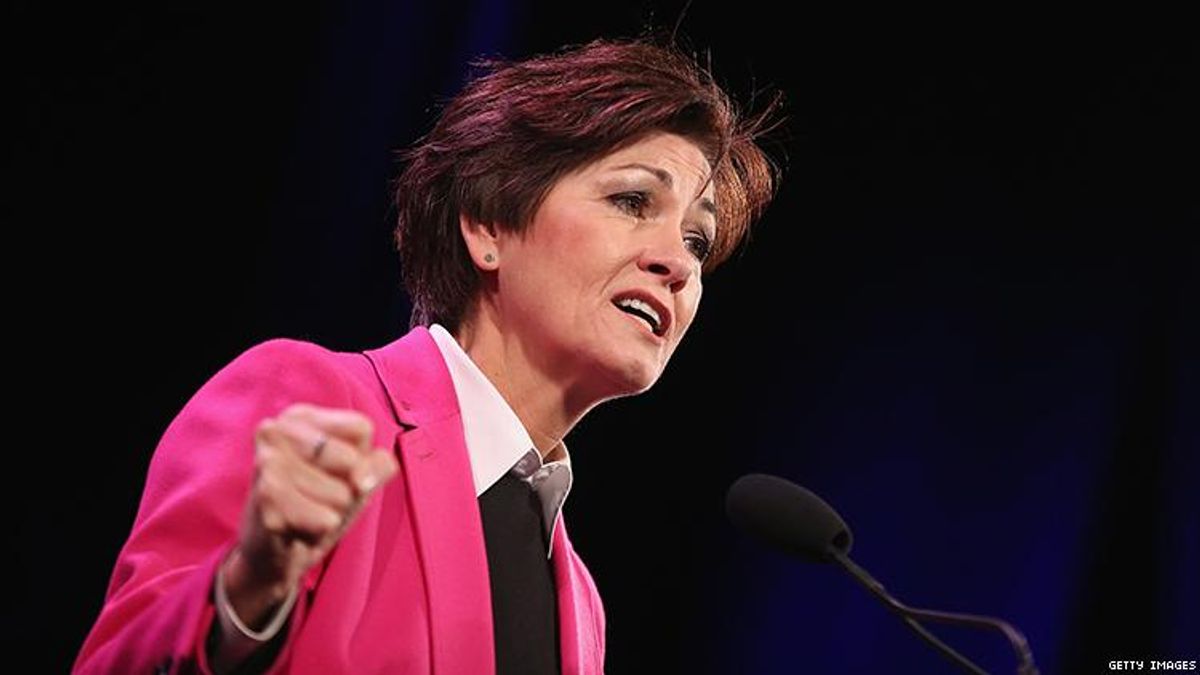 Iowa governor Kim Reynolds signs health care budget bill restricting transgender access and Planned Parenthood funding.