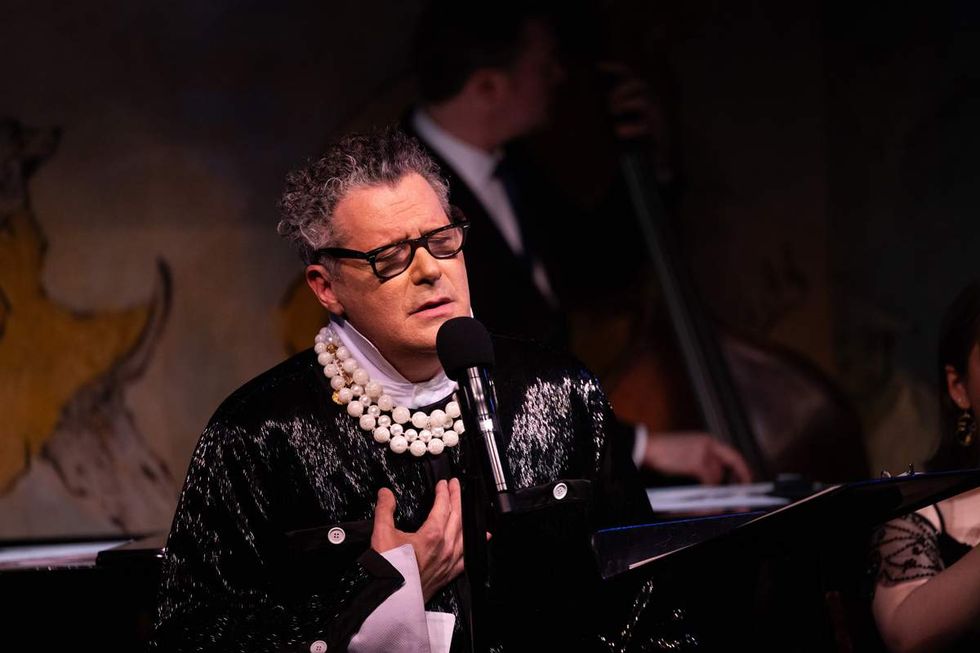 Isaac Mizrahi onstage at Cafe Carlyle